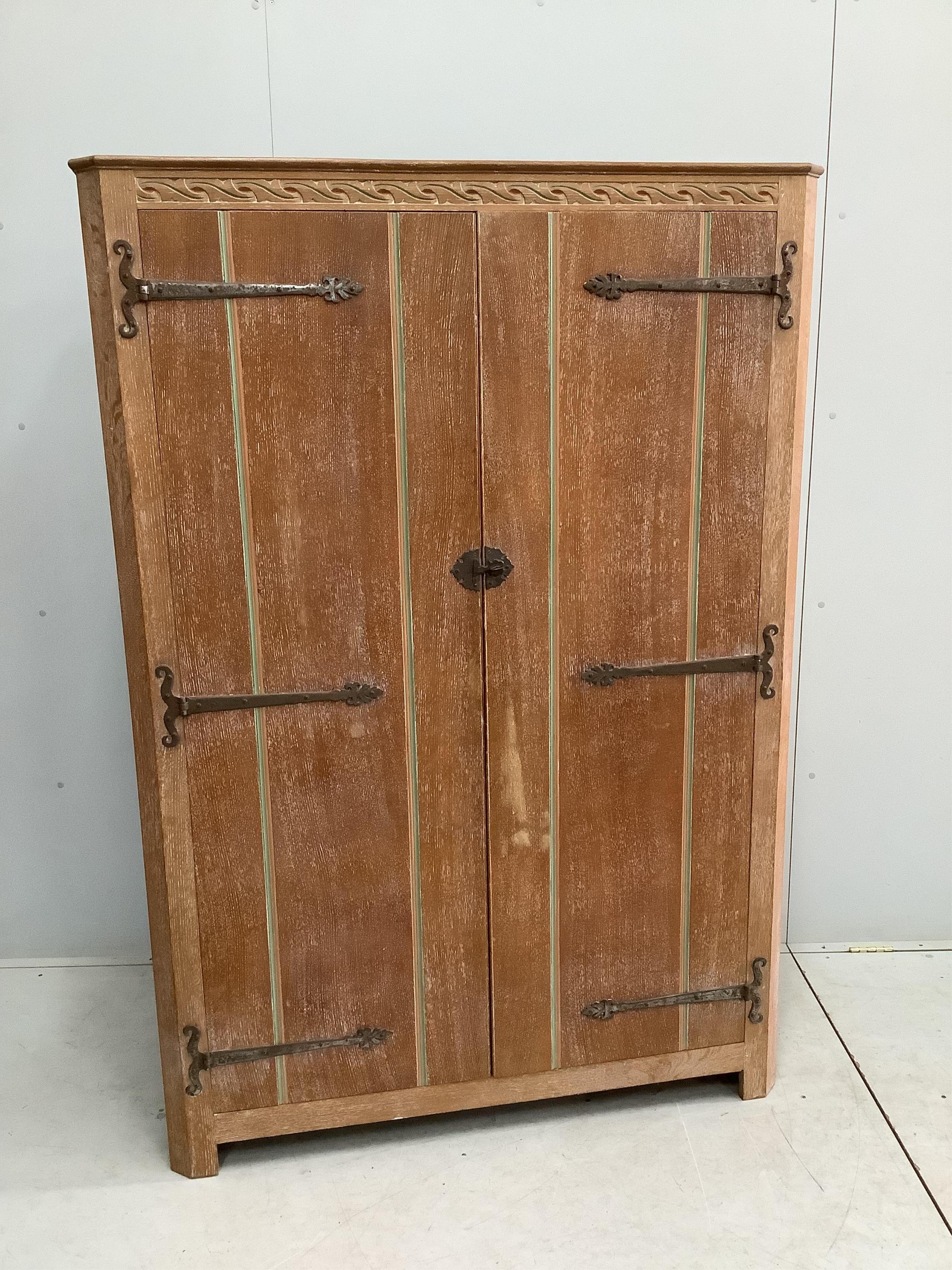 A painted limed oak eight piece bedroom suite, comprising a pair of three drawer chests, pair of bedside cabinets, dressing table stool, wardrobe and headboard. Condition - fair